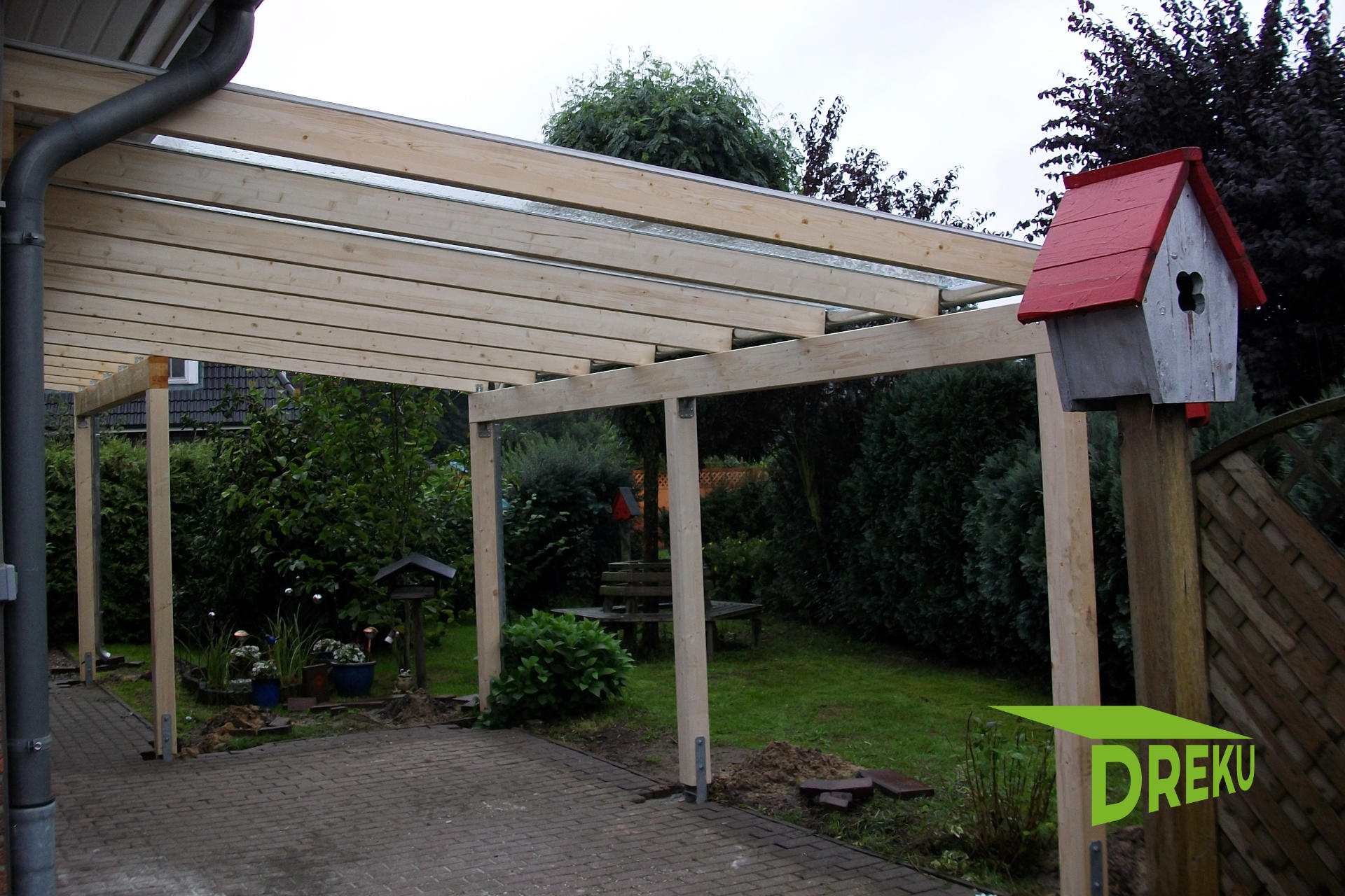 Terrassendach aus Leimbinderholz mit 8 mm VSG - Glas